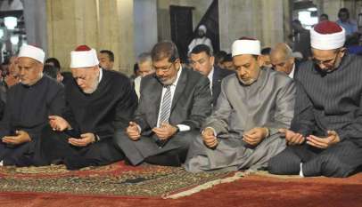 مرسي وشيخ الأزهر